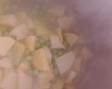 A picture of step 2 of Matar pulao.
