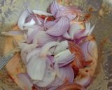 A picture of step 3 of Schezwan onion fritters.