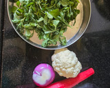 A picture of step 1 of Methi spring onion Dhebra.