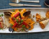 Foto del paso 3 de la receta: Guarguerones en crema marinera con Mariscos y arvejas