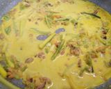 A picture of step 2 of Spaghetti with speck, courgette and pumpkin flowers.