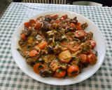 Une image de l'étape 29 de Veau mijoté aux légumes et citron confit.