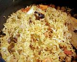 A picture of step 4 of Aalu soyabean pulav.