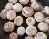 A picture of step 2 of My Butter Fried Pansetta Garlic mushrooms and cherry Tomatoes.