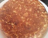 A picture of step 8 of Potato Omelette Stuffed with Cheese and Ham.