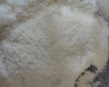 A picture of step 1 of Chocolate coated Hazelnut filled coconut laddu.