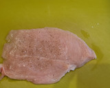 Foto del paso 6 de la receta: Rollitos de pollo y jamón en salsa de pimientos del piquillo