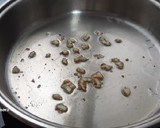 Foto del paso 3 de la receta: Garbanzos con bacalao fresco y toque picante
