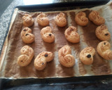 Foto del paso 11 de la receta: Palmeritas de hojaldre con azúcar, coco rallado y pasas