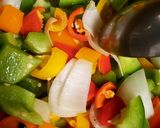 A picture of step 1 of Restaurant style multi colored bell pepper curry.