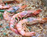 Foto del paso 11 de la receta: Arroz meloso de calamar y gamba roja