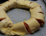 Foto del paso 7 de la receta: Rosca de salchichas y queso cheddar