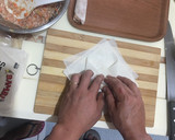 A picture of step 4 of Cheat Day Crispy pork spring rolls.