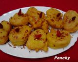 Foto del paso 7 de la receta Buñuelos de gambas al ajillo con lascas de chile