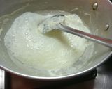 A picture of step 6 of Spnich rabdi with peanuts & Chocolate balls.