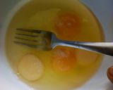 A picture of step 1 of Egg and cheddar toasted sandwich.