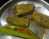 A picture of step 2 of Bharwa karela.