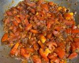 A picture of step 1 of Brinjal and Capsicum Masala.