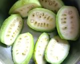 A picture of step 1 of Kakroler Pur/ Teasle gourd pakoda.