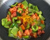 A picture of step 9 of Capsicum Tomato Rice.