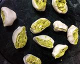 A picture of step 6 of Bhakarwadi stuffed with peas.
