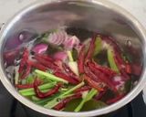 A picture of step 1 of Rice Noodles with Fish Curry Sauce.