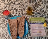 A picture of step 1 of Seven-Grain Bread Sandwich with Turkey Breast and Peppers.