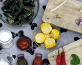 Foto langkah ke 1 dari resep Kerang Hijau Saos Padang Mix Jagung.