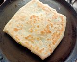 A picture of step 7 of Gozleme / Turkish stuffed flat bread.