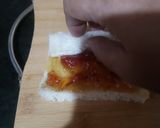 A picture of step 3 of One bite pin wheel sandwiches.