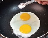 A picture of step 1 of Eggs Fried Rice.