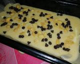 A picture of step 6 of Banana Bread with Chocolate Chip Streusel with Cream Cheese Filling.