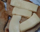 Foto del paso 2 de la receta: Milanesas al horno con mozzarella y queso azul - rúcula y tomates