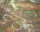 A picture of step 4 of Fried rice with peppered chicken dressed with cucumber.