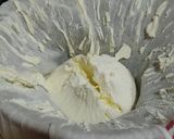 A picture of step 4 of Shrikhand Puri.