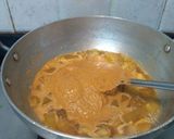 A picture of step 5 of Amlechi Uddamethi Raw Mango curry.