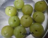 A picture of step 1 of Awla Murabba/Gooseberry sweet pickle.