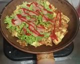 Foto langkah ke 4 dari resep Omelet Roti Tawar Isi.