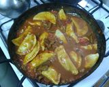 Foto del paso 6 de la receta: Pierogi relleno con calabaza y muzzarella y tuco con tapa de asado