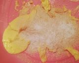 A picture of step 2 of Cinnabon with raisins.