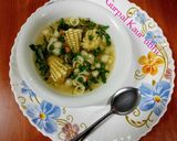 A picture of step 5 of Corn, macaroni soup 🍲🍅🧅🥕.