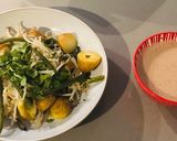 A picture of step 4 of Charlotte potato, green bean and bean sprout tray bake with peanut, coconut and chilli dressing.