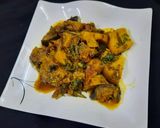 A picture of step 7 of Aloo Baingan.