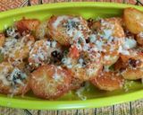 A picture of step 7 of Oven roasted chilli potato.....