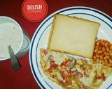 A picture of step 3 of Bread & fried eggs with a cup of tea.