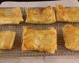 A picture of step 15 of Raspberry White Chocolate Pastry Strudels.