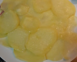 Foto del paso 3 de la receta: Huevos con base de patatas y virutas de jamón