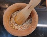 A picture of step 4 of Suquet de Monkfish, Red Shrimp, and Baby Squid with Almond and Hazelnut Picada.