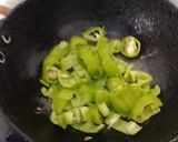 A picture of step 2 of Green chilli in curd.