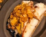 A picture of step 5 of STEAK and SHREDDED CHICKEN BURRITOS WITH MELTED CHEESE/FRITOS: JAYS SMOTHERED BURRITO.
